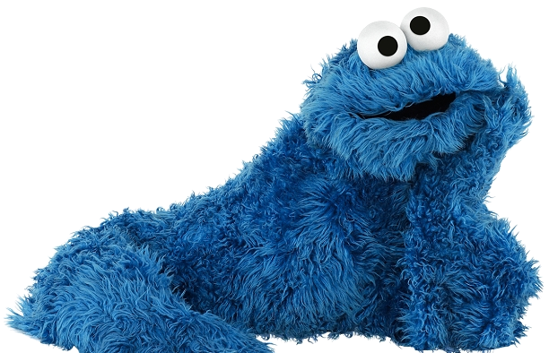 A melancholic Cookie Monster rests his head on his left hand.